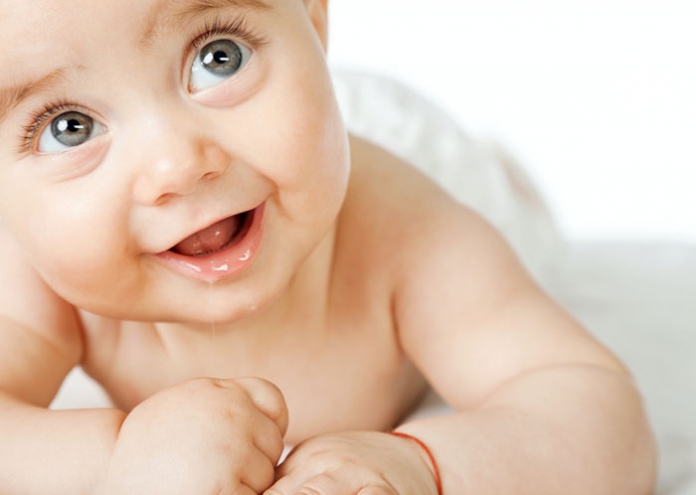 Baby_lachen - shutterstock ID 64615933