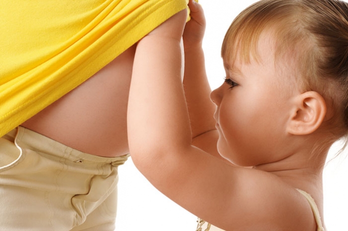 Schwanger_Bauch_Mädchen - shutterstock ID 40867261